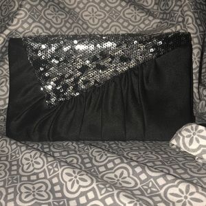Black clutch with silver details (like new)